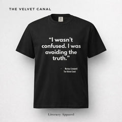 Black t-shirt with white text on a light gray background