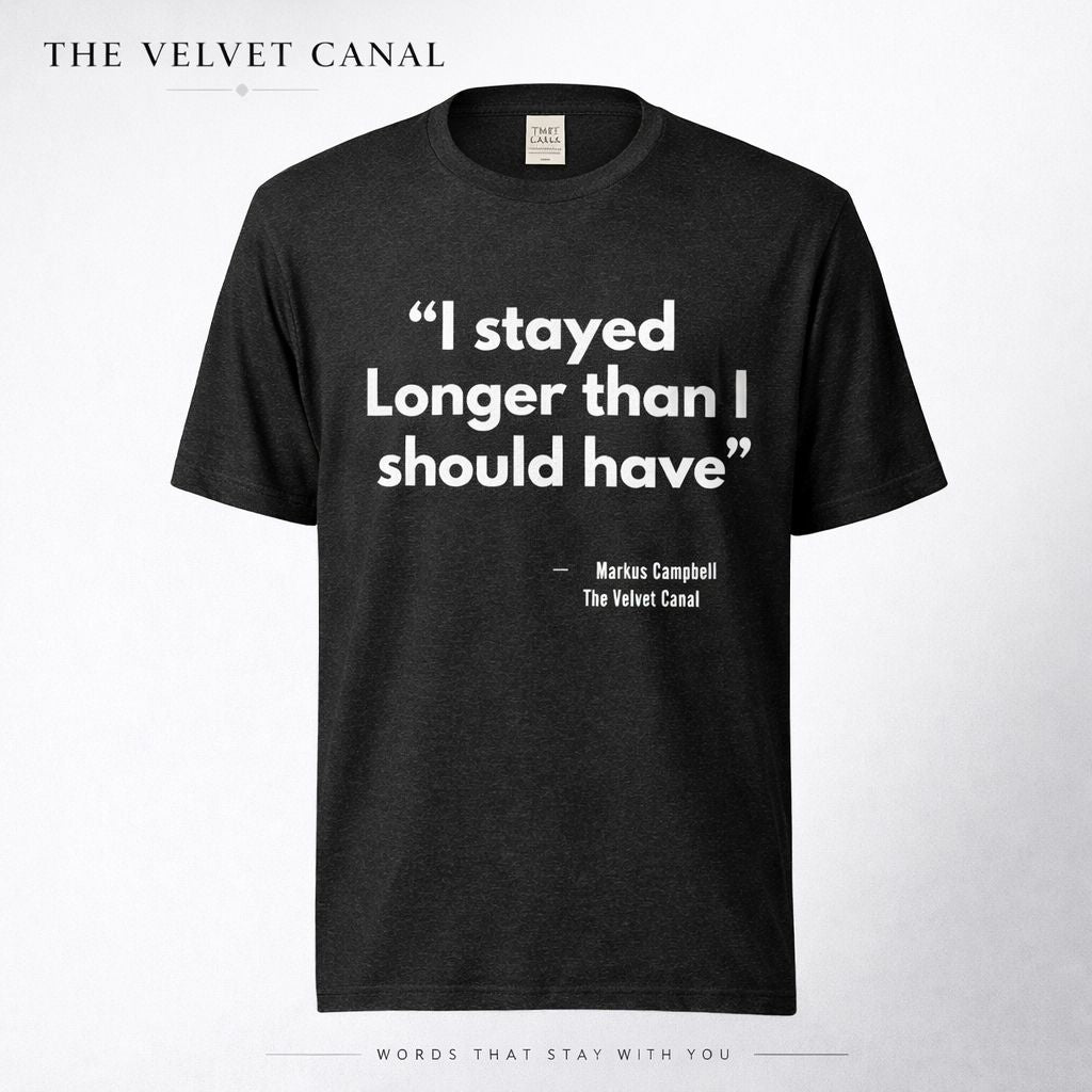 Black t-shirt with white text 'I stayed Longer than I should have' by The Velvet Canal on a white background